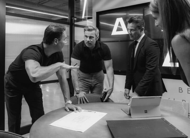 Project consultants and stakeholders collaborating in a structured planning session.