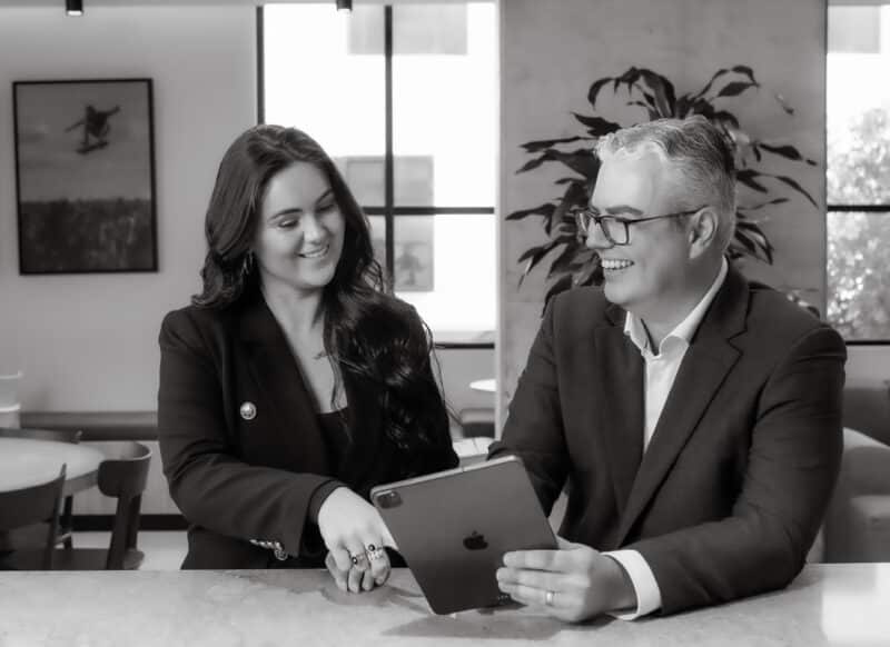 Property manager meeting with a client to review leasing details