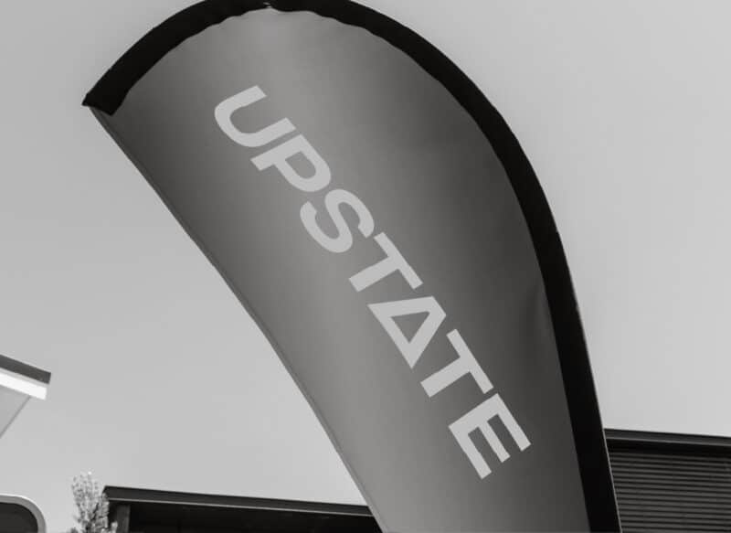 Upstate branding displayed during a residential property marketing campaign