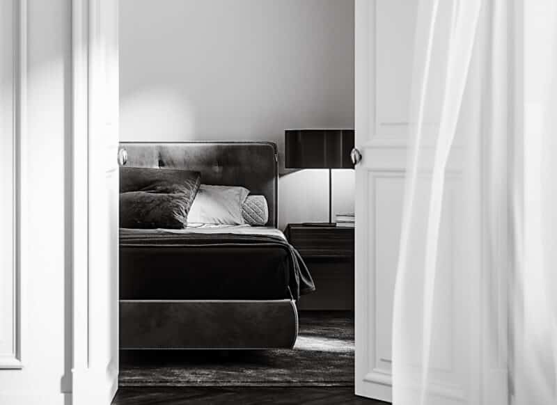 Calm bedroom interior styled with restraint and balance, reflecting outcomes clients value when working with Upstate